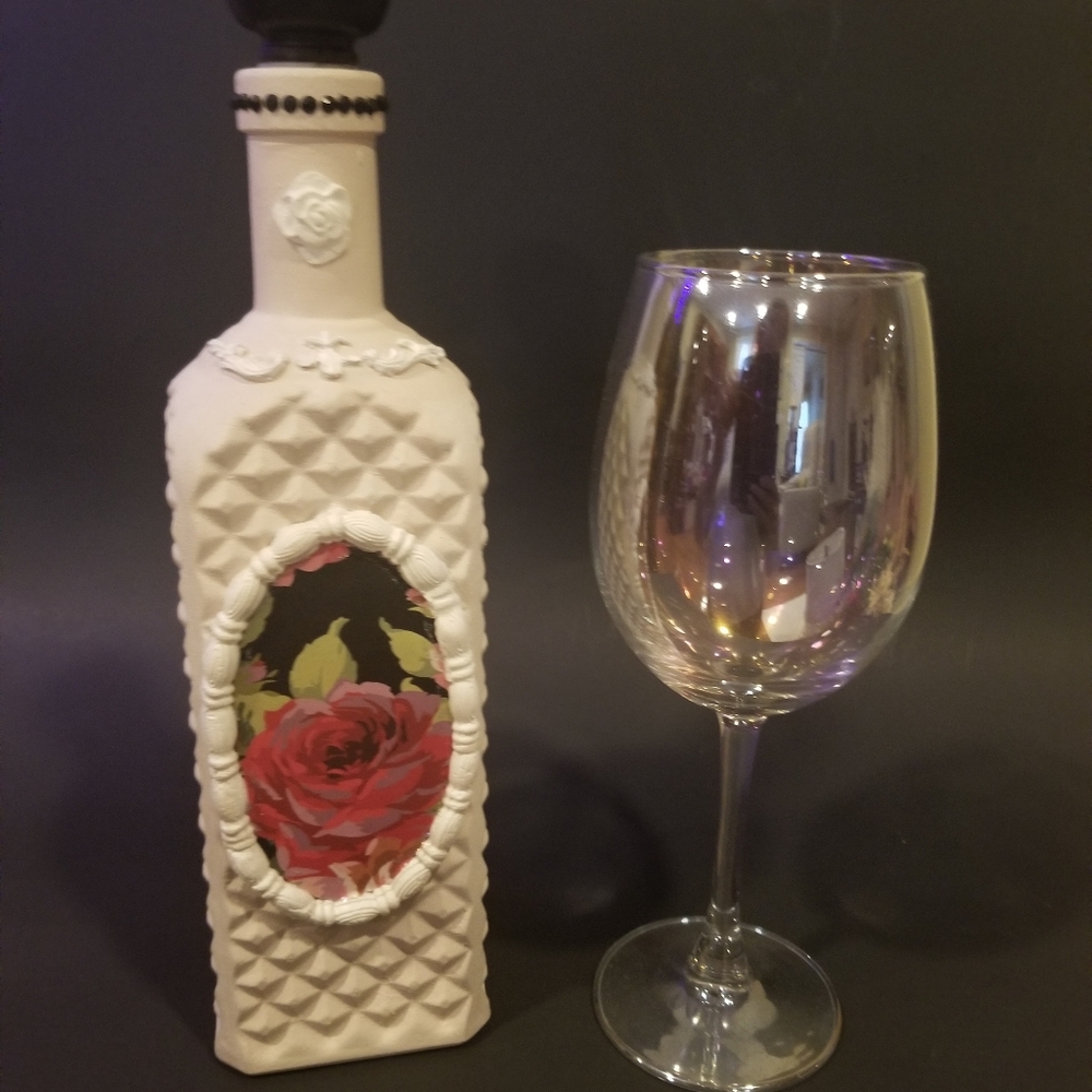 Decorated glass bottle
